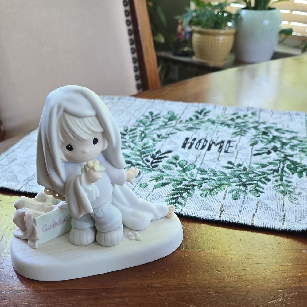 Charming Child Figurine with Blanket and Flowers